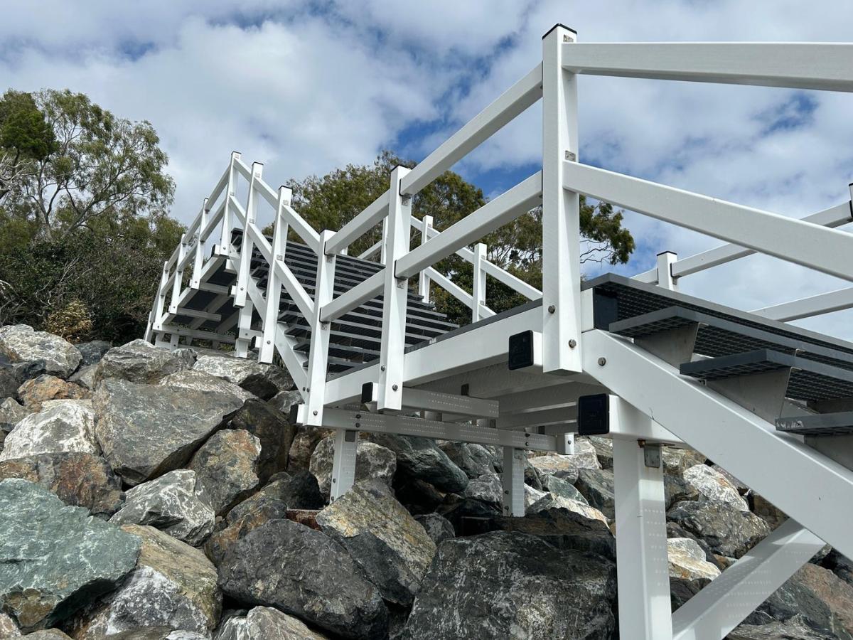 Why Wagners CFT paint their FRP pultruded profiles instead of just using UV inhibitors